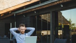 Handsome businessman working with laptop